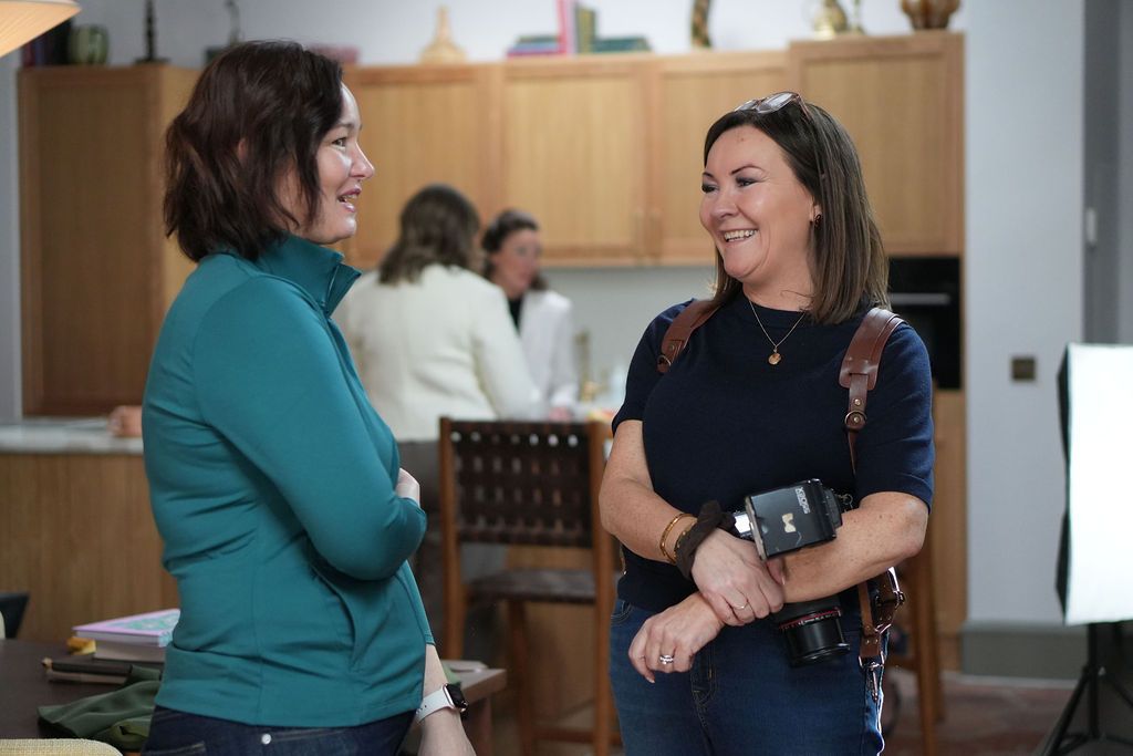 Jacqui chatting with an attendee at a content day