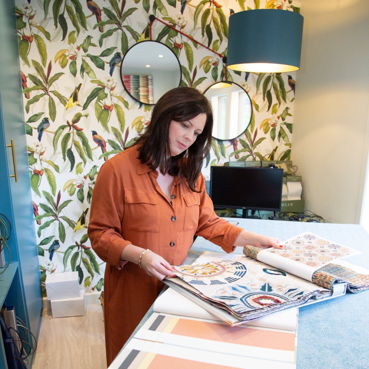 Interior designer looking through fabric samples