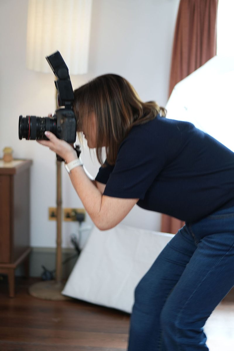 Jacqui photographing a client
